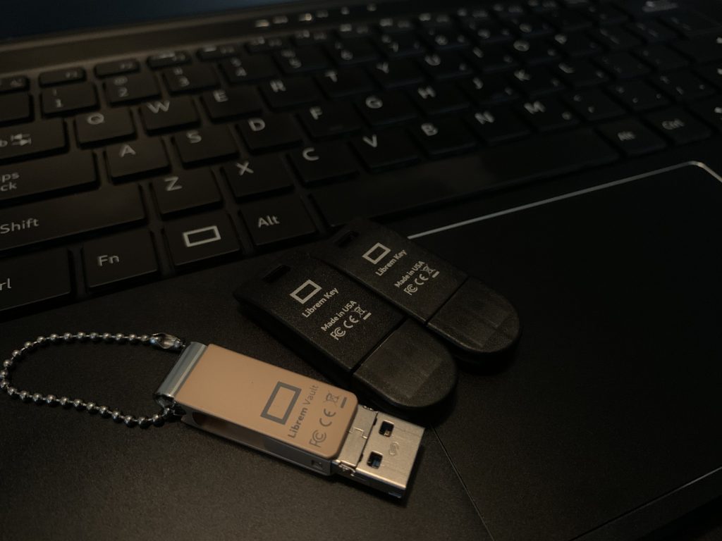 Librem Vault and a pair of Librem Keys on a Librem 14