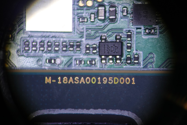 Inspection of Liberty Phone PCBA under a microscope