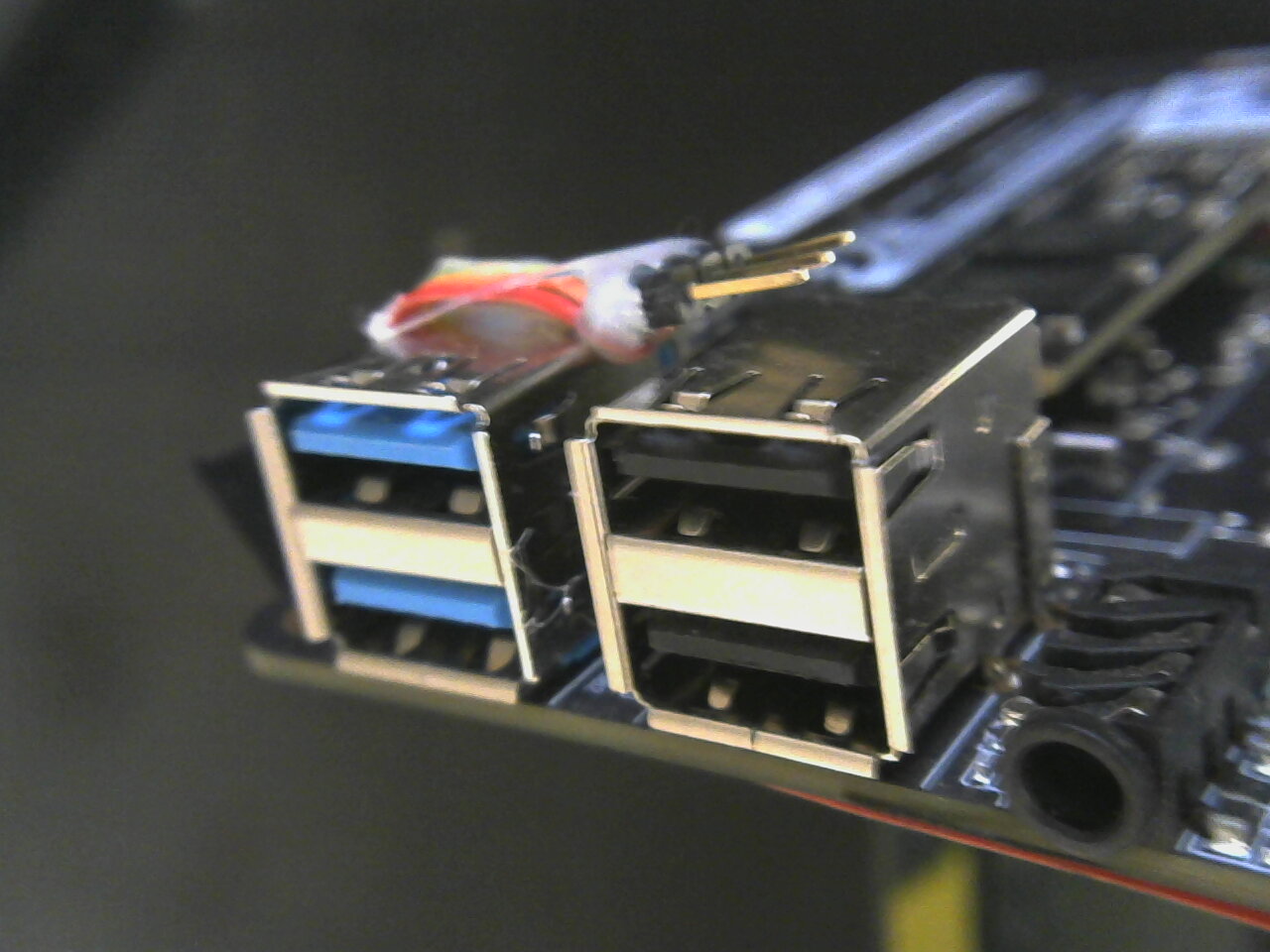 Librem Mini v2, UART pins glued on top of USB connector