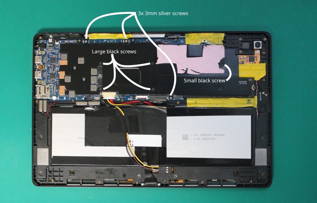 Photo of Librem 11 with midframe removed and annotations for heat spreader screws