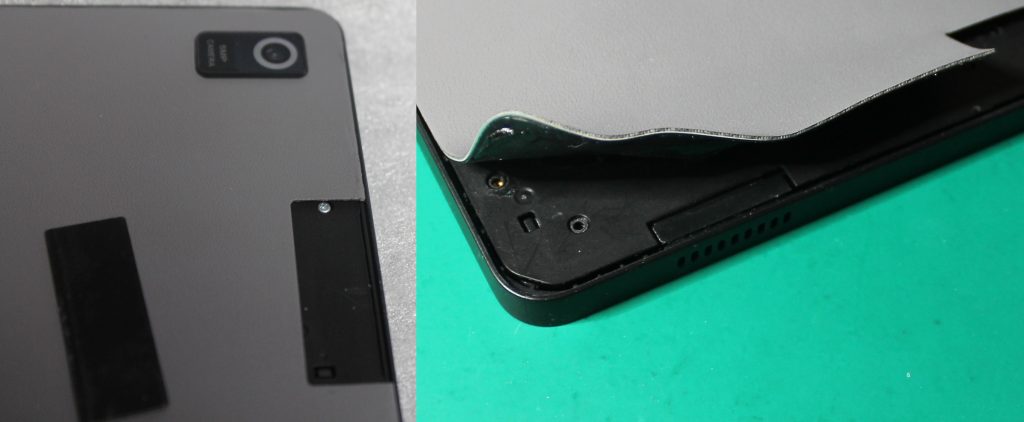 Photos - Librem 11 "OLED Inside" label removed showing a screw, and peeling the back from the edge